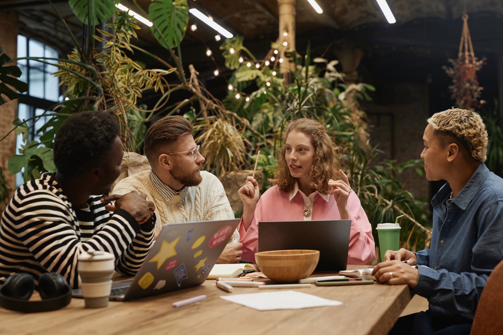 Young Businesswoman Leading Business Meeting with Team